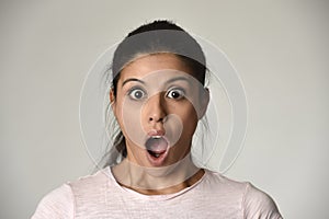 Young beautiful surprised woman amazed in shock and surprise with mouth big opened