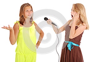 Young beautiful teenage girl conducts interviews with the singer