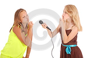 Young beautiful teenage girl conducts interviews with the singer