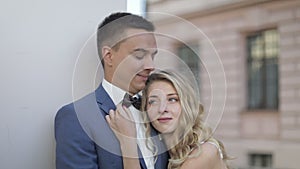 Young and beautiful wedding couple together. Lovely groom and bride. Wedding day. Slow motion