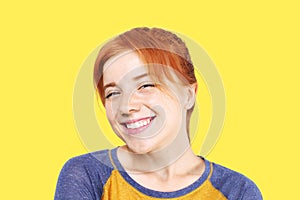 Young beautiful woman, attractive natural redhead, showing emotions, facial expressions, posing on isolated background.