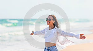 Young beautiful woman on beach vacation on Caribs