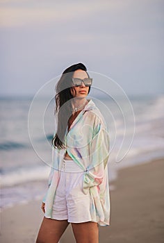 Young beautiful woman on beach vacation on Caribs