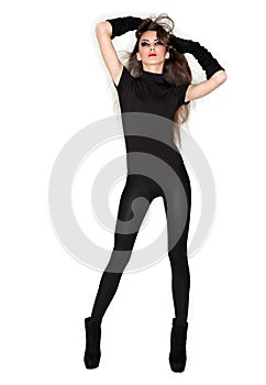 Young beautiful woman in black combi dress