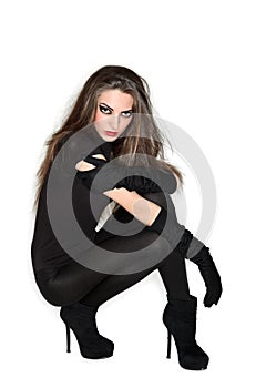 Young beautiful woman in black combi dress photo