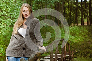 Young beautiful woman on the brige