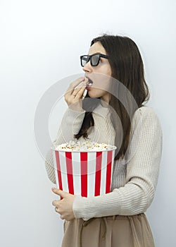 a young beautiful woman brunette with a popcorn