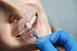 Young beautiful woman at the dental clinic at the doctorâ€™s appointment