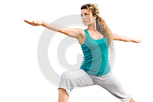 Young Beautiful Woman Doing Yoga Warrior Pose