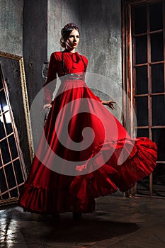 Young beautiful woman in dress photo