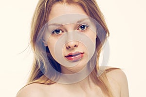 Young beautiful woman face portrait healthy skin