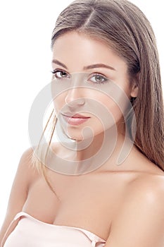 Young beautiful woman face portrait with healthy skin