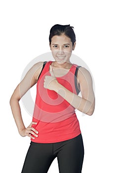 Young beautiful woman during fitness time and exercising with bl