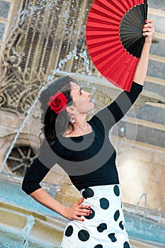 Young beautiful woman in a flamenco costume.