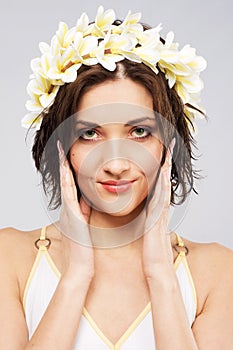 Young beautiful woman in flower crown