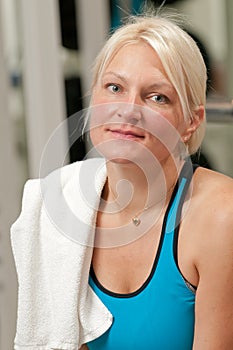 Young beautiful woman at the gym