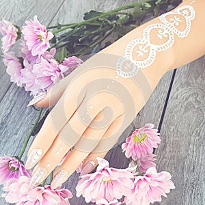 Young beautiful woman hands with elegant manicure