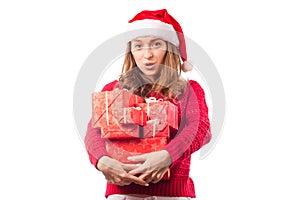 Young beautiful woman in hands holding a new year christmas holiday gift