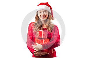 Young beautiful woman in hands holding a new year christmas holiday gift