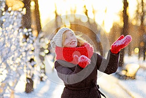 Young beautiful woman having fun in winter