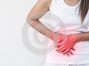 Young beautiful woman having painful stomachache on white background.Chronic gastritis. Abdomen bloating concept.