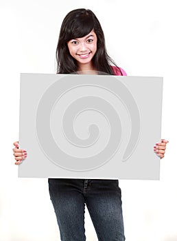 Young beautiful woman holding blank white card