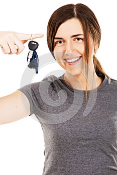 Young beautiful woman holding car keys