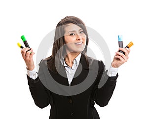 Young beautiful woman holding colorful highlighters
