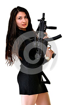 Young beautiful Woman holding Handgun in hand