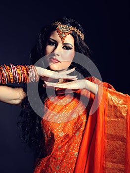 Young beautiful woman in indian traditional sari