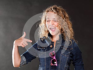 Young beautiful woman with long curly blond hair