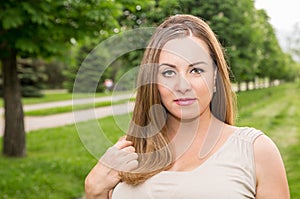 Young beautiful woman with long hair outdoor