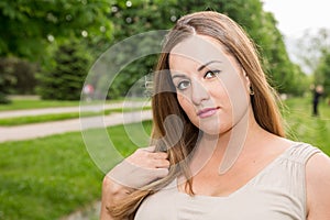 Young beautiful woman with long hair outdoor