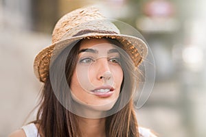 Young beautiful woman looking away