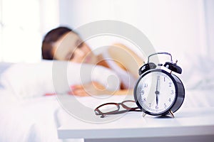 Young beautiful woman lying in bed.