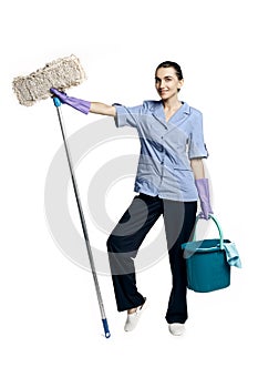 Young beautiful woman in a maid costume smiling holding a bucket and a mop, isolated on a white background