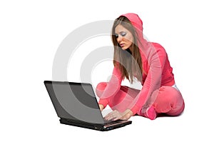 Young beautiful woman in the pink sportswear