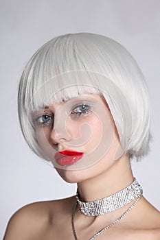 Young beautiful woman in platinum blonde wig