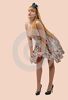 Young beautiful woman posing, retro styling