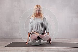 Young beautiful woman practicing yoga