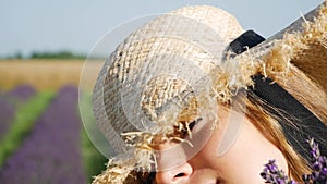 Young Beautiful Woman Relaxing In Lavender Field On Summer Day