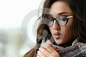Young beautiful woman in a scarf portrait is