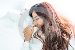 Young beautiful woman sleeping on the bed