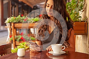 Young beautiful woman with smartphone as symbol of social Media addiction. Psychological problems and media mania concept