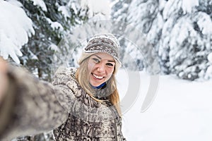 Young Beautiful Woman Smile Camera Taking Selfie Photo In Winter Snow Forest Girl Outdoors