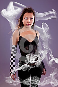 Young and beautiful woman, with smoke effects