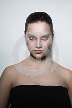 Young beautiful woman with smoky eye makeup