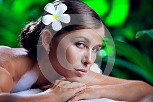 young beautiful woman in spa environment.