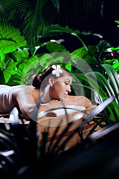 young beautiful woman in spa environment.