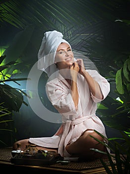 young beautiful woman in spa environment.